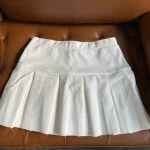 Lioness Pleated Tennis Skirt